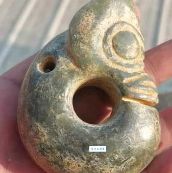 玉猪龙是哪个新石器时代文化的宝贝？